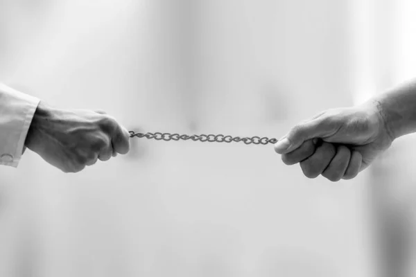 Shot Two Hands End Rusted Metal Chain Pulling Both Sides — Stock Photo, Image