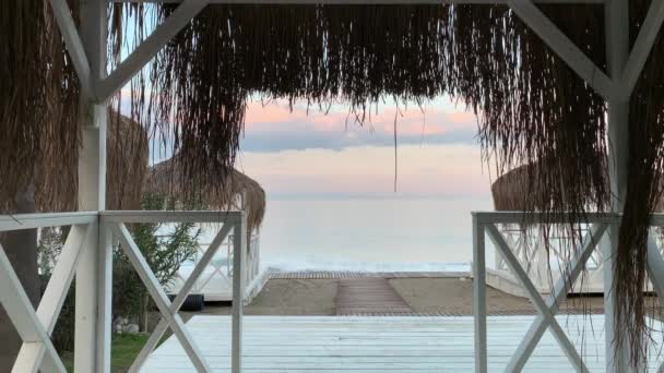 View Beach Tent Thatched Roof Sea Early Evening Soft Delicate — Stock Video