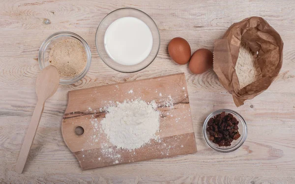 Dough recipe ingredients on vintage rural wood kitchen table — Stock Photo, Image
