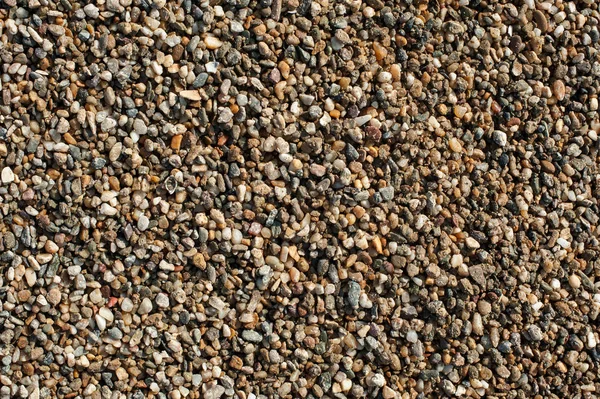 Petit et grand sable, gravier et galets motif de fond — Photo