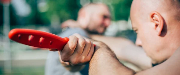 Self defense disarming technique against threat and knife attack — Stock Photo, Image