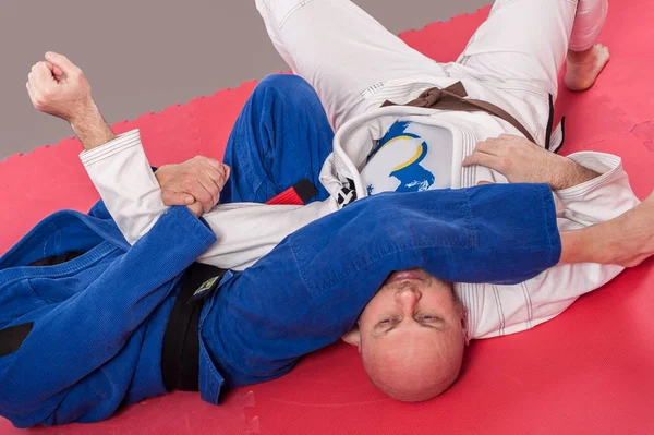 Braziliaans jiu jitsu training. Parterre en grond lock-techniek — Stockfoto