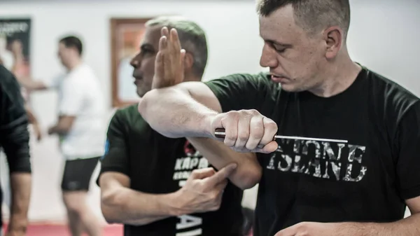 Kapap Krav Maga instructor Avi Nardia demonstrates escrima stick-fighting –  Stock Editorial Photo © guruxox #315081816