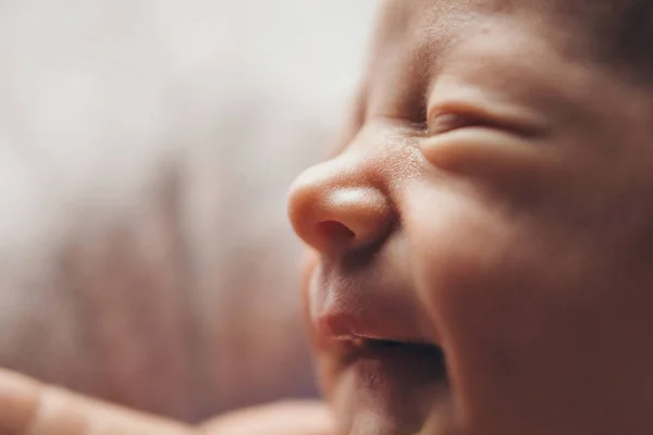 Newborn baby's face close up: eyes, nose, lips. concept of childhood, health care, IVF, hygiene, ENT — Stock Photo, Image