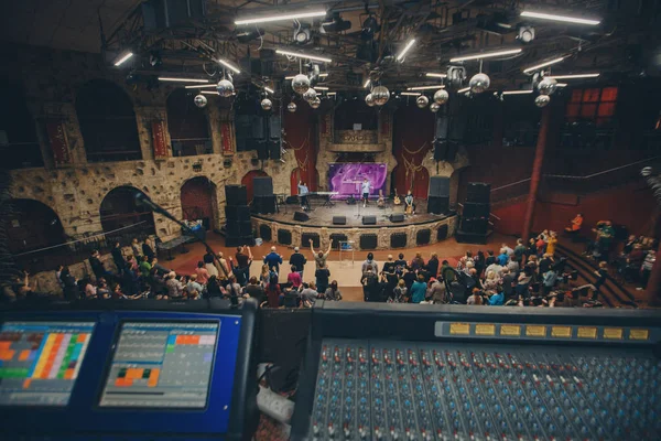 12.12.2019 Ufa. Concert hall Colosseum . Concert of rock music. remote recorders close-up. Electric machine on the table to work as a sound engineer or club DJ at a night club party. Objects to listen — ストック写真