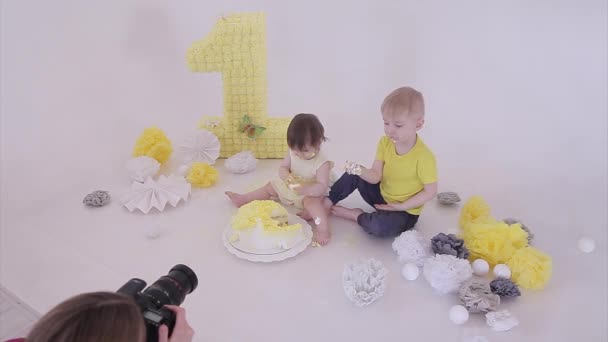 Birthday Celebration Boy Little Girl Eating Cake Hands White Background — Wideo stockowe