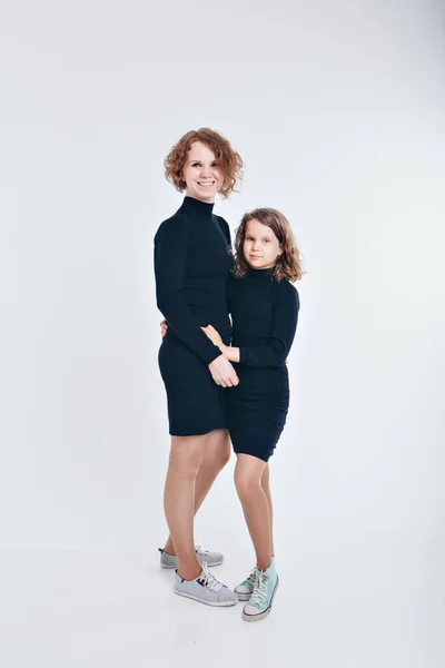 Two Happy Girls Smiling White Background Portrait Mother Daughter Embracing — Stock Photo, Image