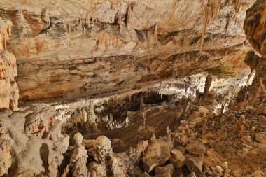 Postojna cave, Slovenia. Formations inside cave with stalactites clipart