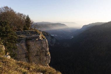 Creux-du-Van or Creux du Van: Rocky Amphitheater during sunrise