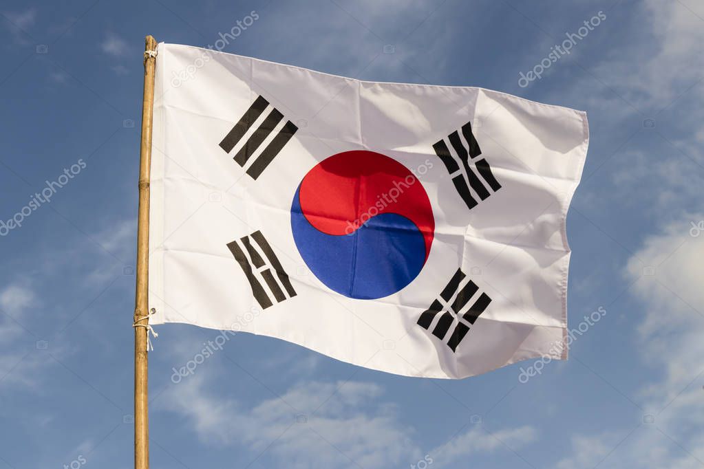 South Korea flag waving against clean blue sky