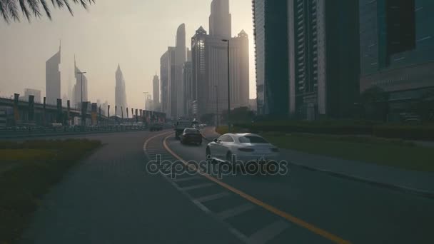 Zachód słońca wysoki budynek Burdż Dubajj. Skyline Cityscape miasto — Wideo stockowe