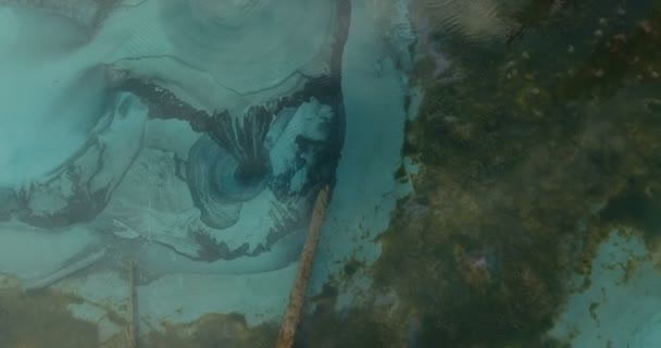 Amazing air-view on a geyser lake of azure color. Unfreezing thermal — Stock Video