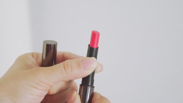 Decorative cosmetics: bright lipstick. Concept of female beauty. — Stock Video