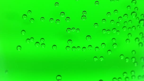 Текстура и процессы внутри химического стекла: зеленая жидкость — стоковое видео