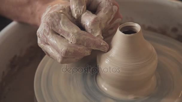 Hands gently create correctly shaped handmade from clay. — Stock Video