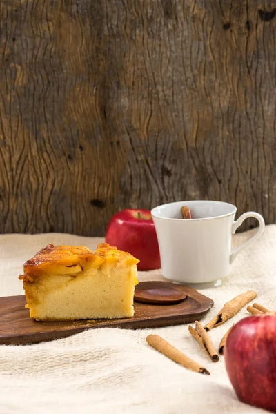 homemade apple cake with cinnamon and apple juice, autumn dessert concept