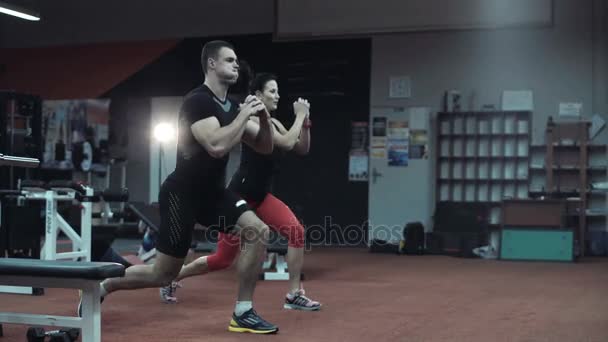 Two fit athletes doing cardiovascular exercises — Stock Video