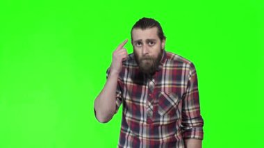 Adam bir işaret parmağı kafasına bir tapınak gösterir