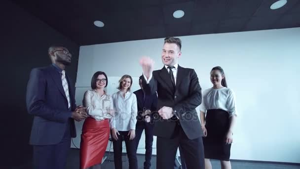 Emotional businessman rejoices at camera — Stock Video