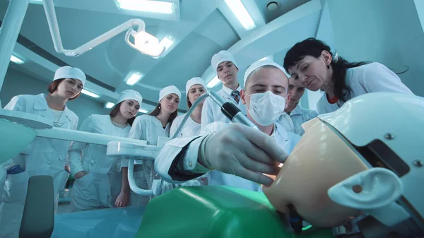 Group of students in dental cabinet — Stock Photo, Image