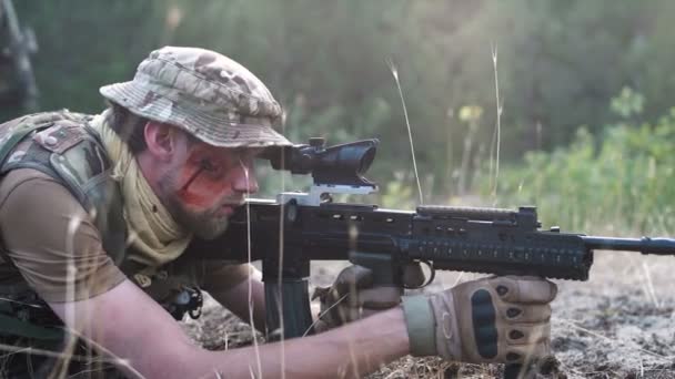 Sniper lying and aiming — Stock Video