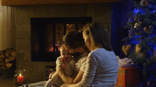 Young parents with their newborn baby — Stock Video