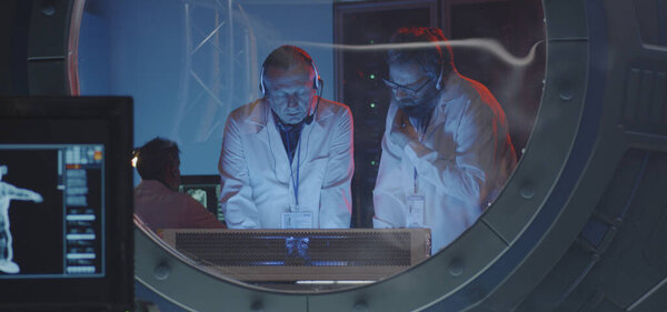 Scientists conducting a test in a lab