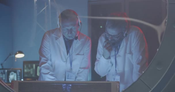 Scientists conducting a test in a lab — Stock Video