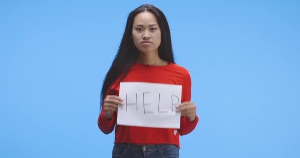 Young woman holding help sign — 비디오