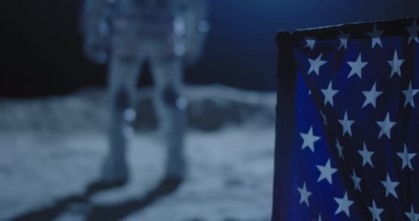 Astronaut jumping behind US flag — Stock Video