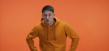 Young man curiously looking