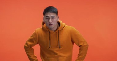 Young man curiously looking