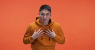 Young man politely avoiding