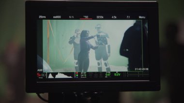 Preparations and a scene shown on screen