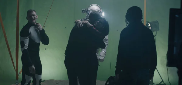 Shooting a scene with an astronaut and the crew celebrating — 图库照片