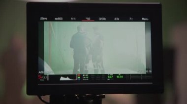 Preparations and a scene shown on screen
