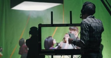 Director giving instructions to film crew