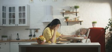 Parents with baby having argument