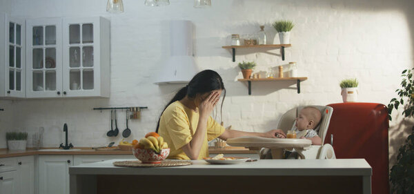 Parents with baby having argument