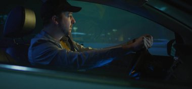 Man speaking to himself while driving