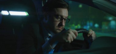 Sleepy man driving at night