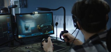 Developer playing a VR game or simulator