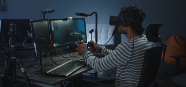 Developer playing a VR game or simulator