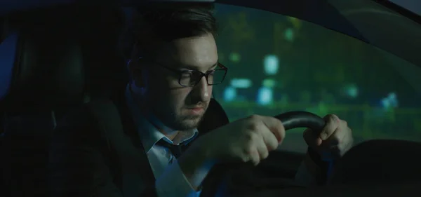 Sleepy man driving at night — Stock Photo, Image