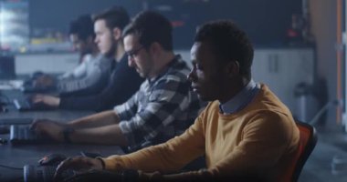 Programmers working in a common office