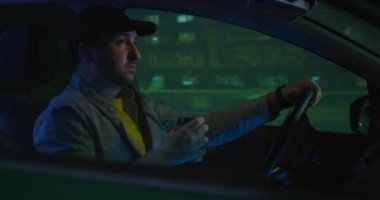 Sleepy man drinking while driving