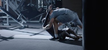 Wheelchair man exercising sit ups
