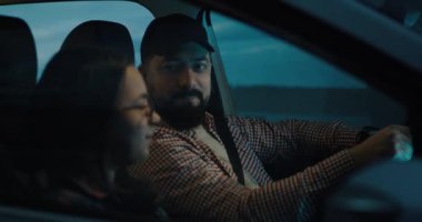 Father talking to daughter while traveling