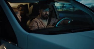 Wife taking away phone from driving husband