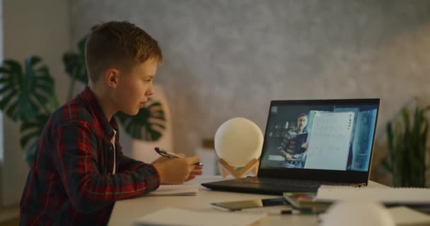 Boy having online matths class — Stock video